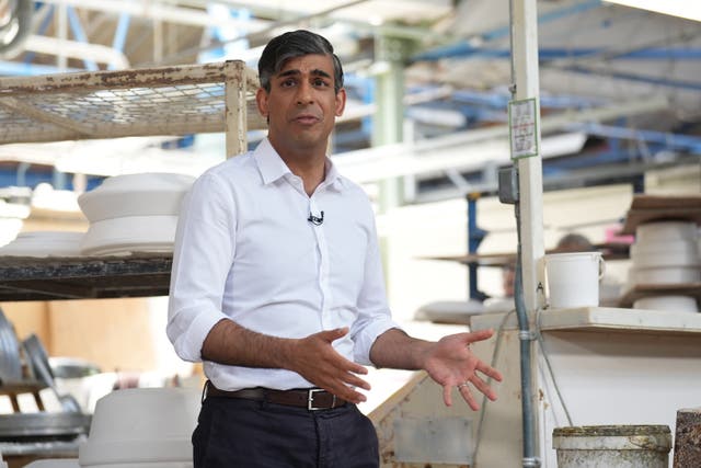 <p>Prime Minister Rishi Sunak on a campaign visit to Denby Pottery Factory, Ripley (Joe Giddens/PA)</p>