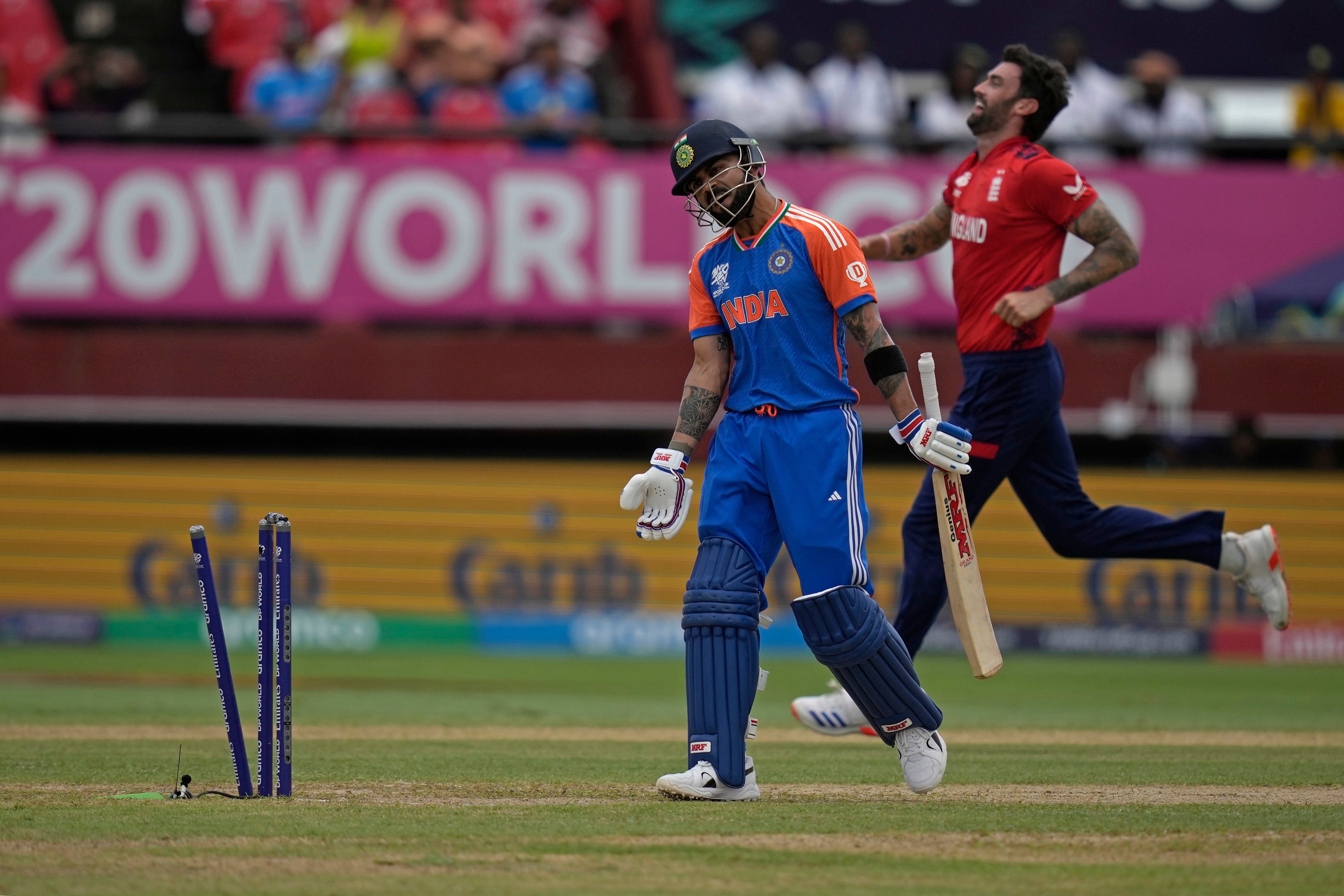 Virat Kohli was bowled by Reece Topley (Ramon Espinosa/AP)