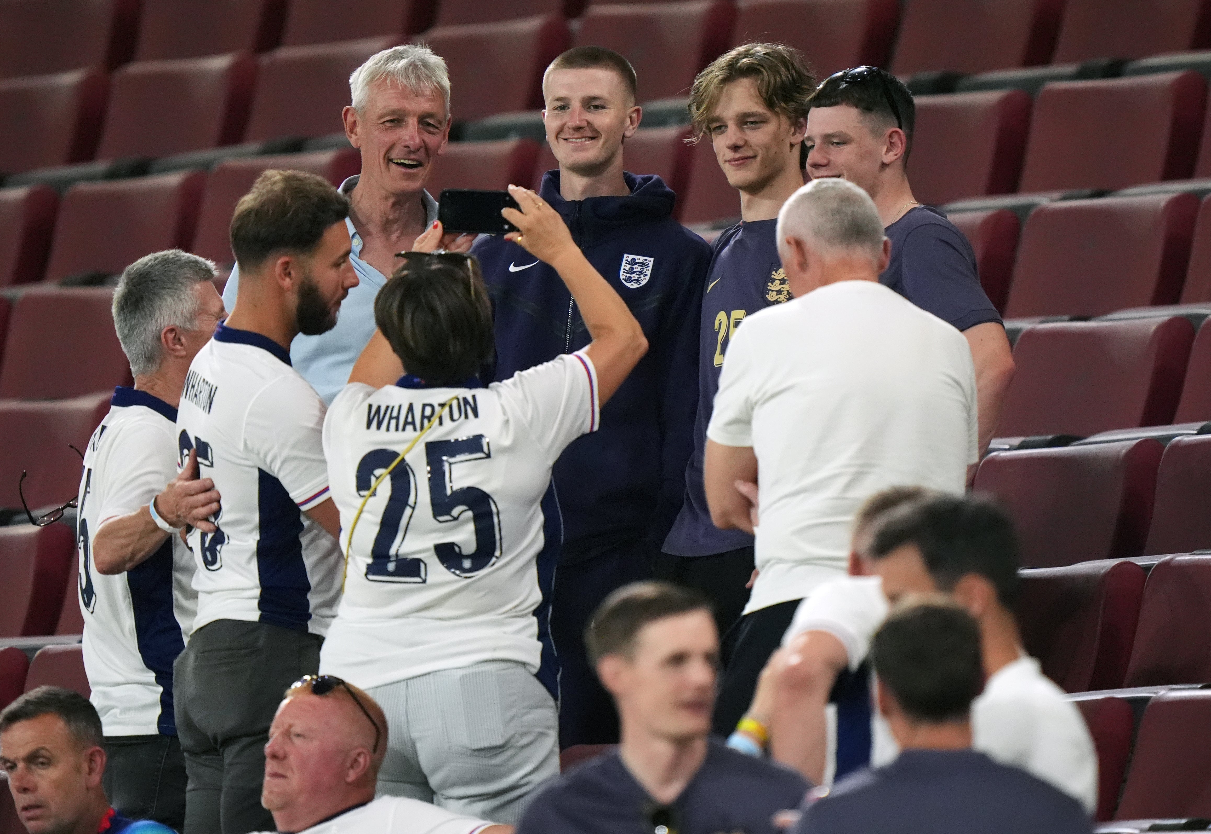 England’s Adam Wharton with family following the match in Cologne (Bradley Collyer/PA)