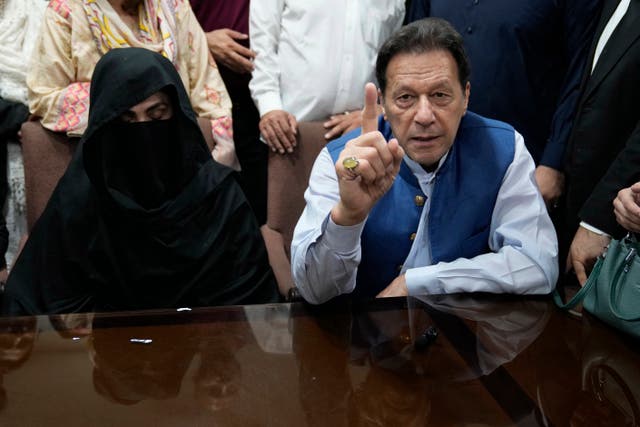 <p>Bushra Bibi and Imran Khan speaking to the media in July 2023 </p>