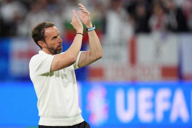 England manager Gareth Southgate applauds the fans after victory over Slovakia (Bradley Collyer/PA).