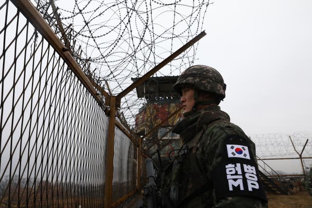 <p>A South Korean soldier guards his post on the border with the North</p>