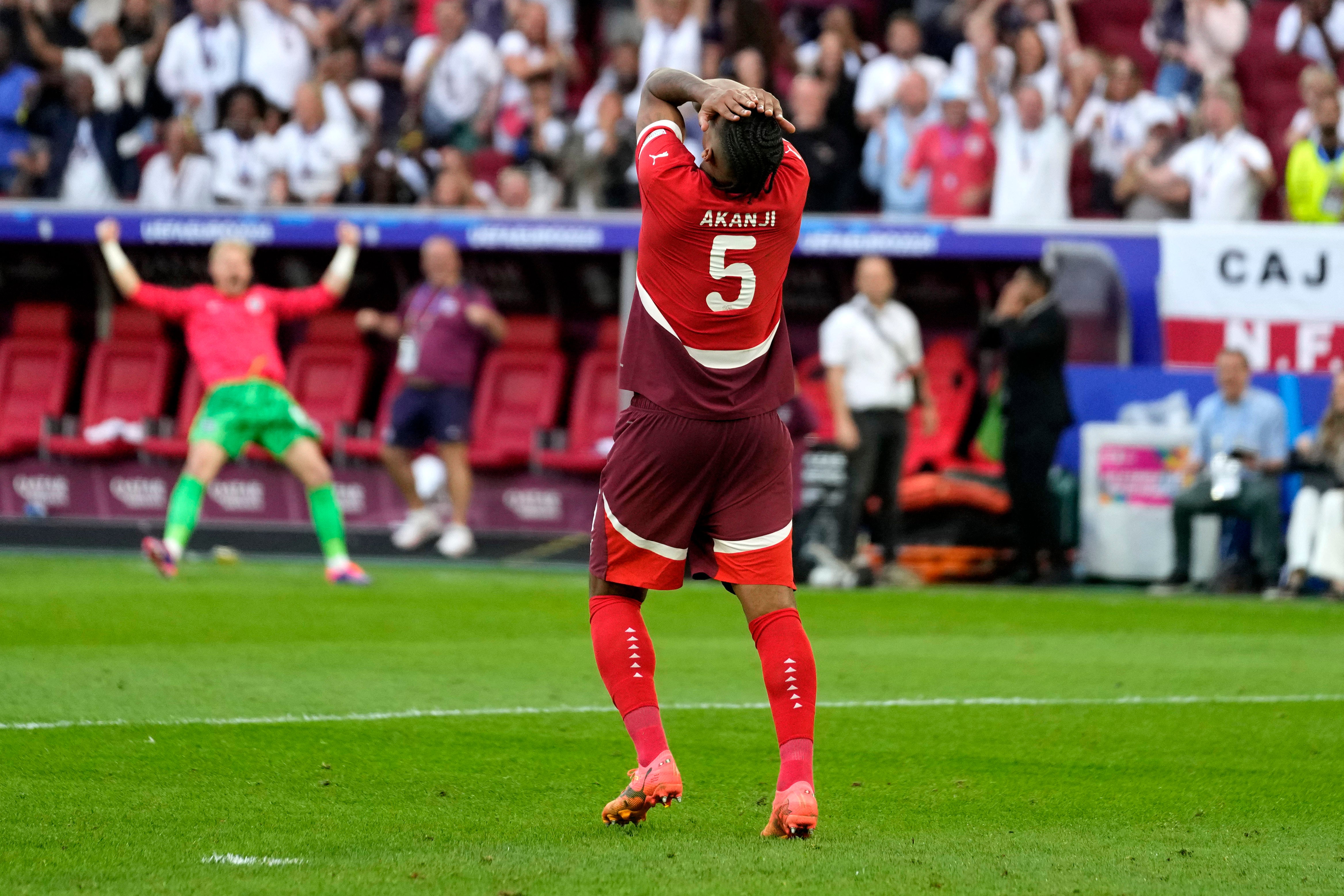 Manuel Akanji saw his penalty against England saved (Darko Vojinovic/AP)