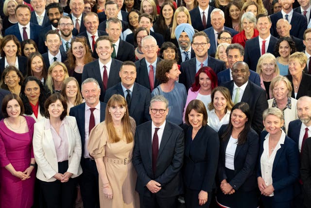 <p>Keir Starmer with Labour MPs on Monday, many of whom are named in the new cabinet</p>