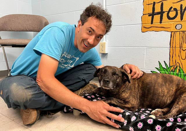 <p> Jesse Rochette poses with Sparsy at the shelter in Pearisburg</p>