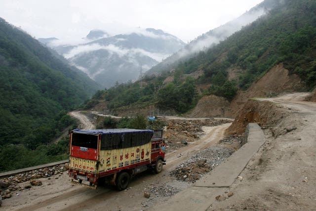 <p>File. A truck drives along an Indian highway close to the Chinese border in the northeastern state of Arunachal Pradesh</p>