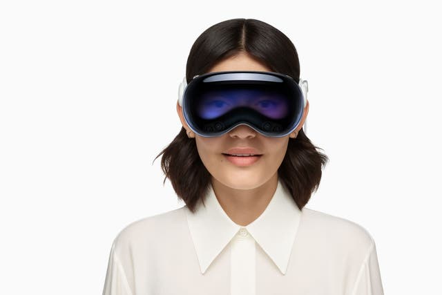 A woman wearing the Apple Vision Pro (Apple/PA)