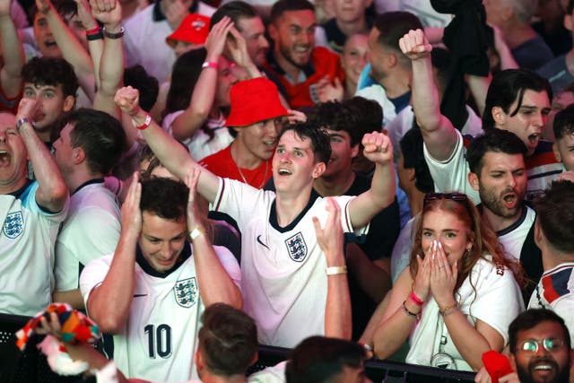 England fans celebrate their side’s second goal of the game at BOXPark Wembley, London, during a screening of the UEFA Euro 2024, semi final match, between England and the Netherlands (Nigel French/PA)