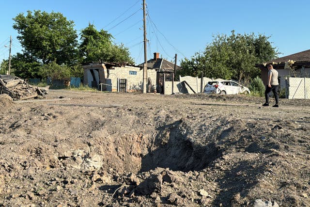 <p>A view shows the site of a Russian missile strike, amid Russia's attack on Ukraine, in the village of Budy, Kharkiv region, </p>