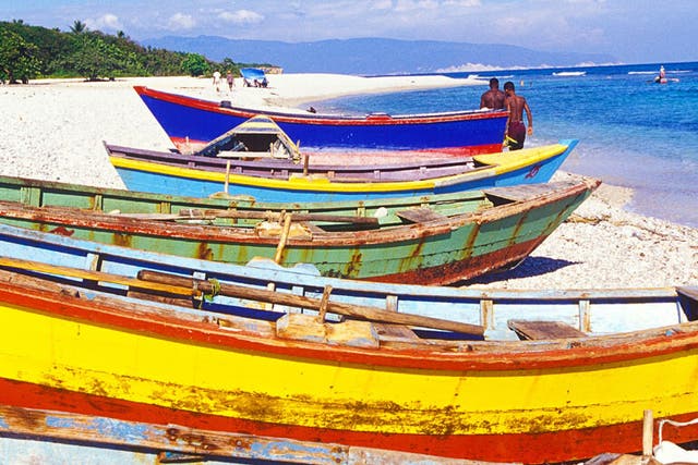 Catch of the day: Bright kayaks and fishing boats line the beach