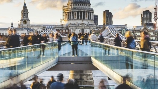 Busy pedestrian bridge in an urban environment