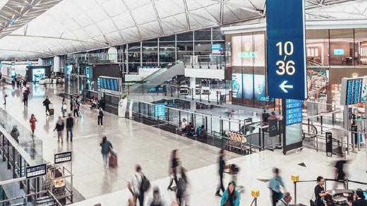 Travelers in a busy, large terminal