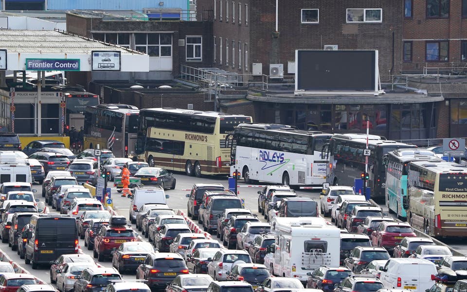 Holidaymakers forced to wait for hours amid large queues for trains and ferries