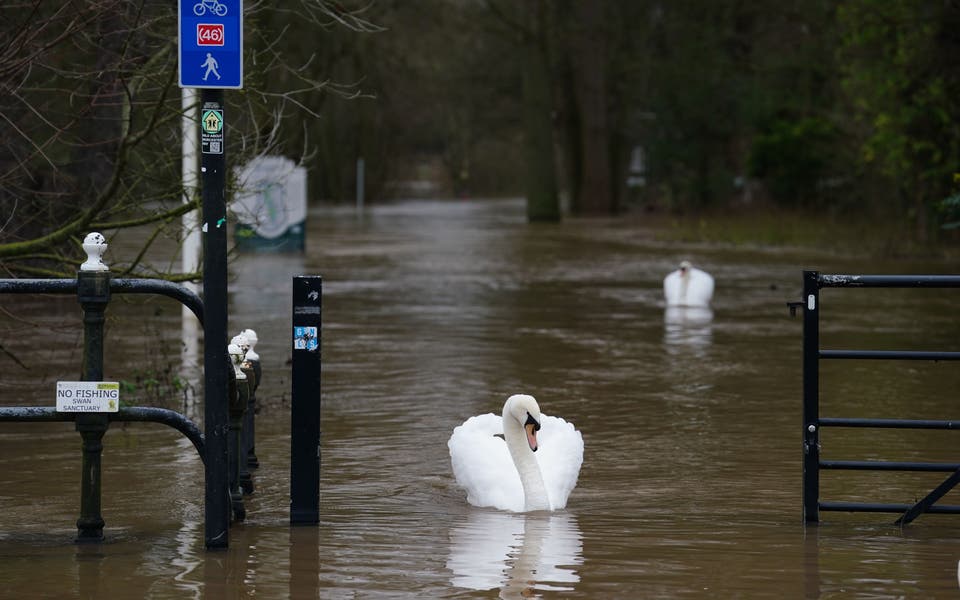 In Pictures: Residents braced for evacuation as heavy rainfall causes flooding