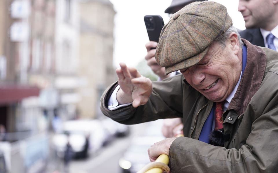 Nigel Farage 'will not surrender to the mob' after hit with object