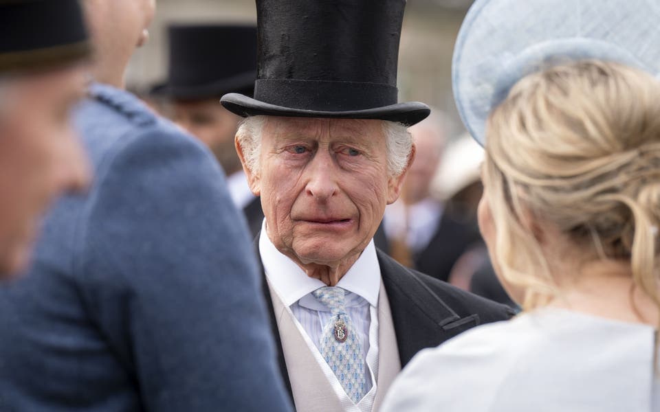 Charles shares memories of school cricket match as he hosts garden party