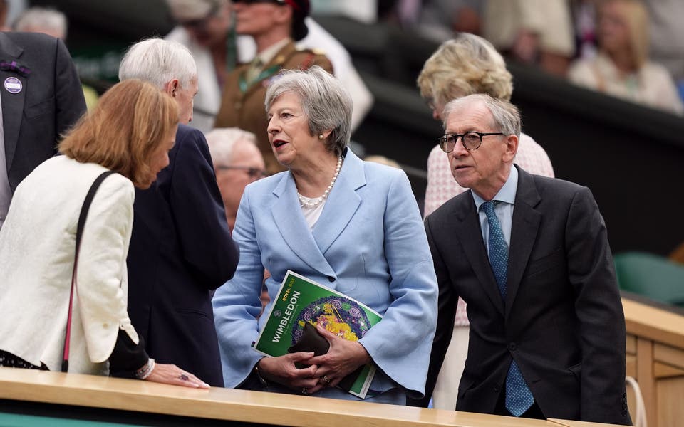 Theresa May and Romeo Beckham among spectators on drizzly day three of Wimbledon