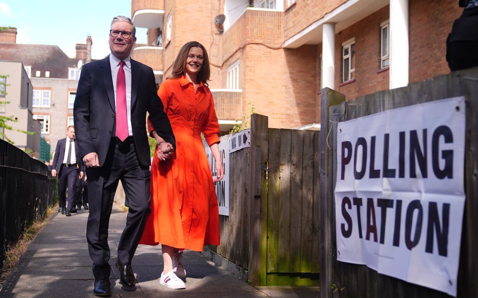 Sunak and Starmer cast their ballots as voting under way in high-stakes poll