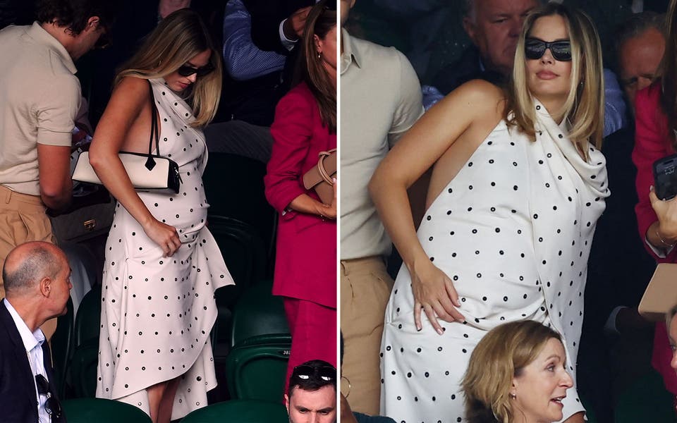 Margot Robbie shows off her baby bump at Wimbledon's Centre Court