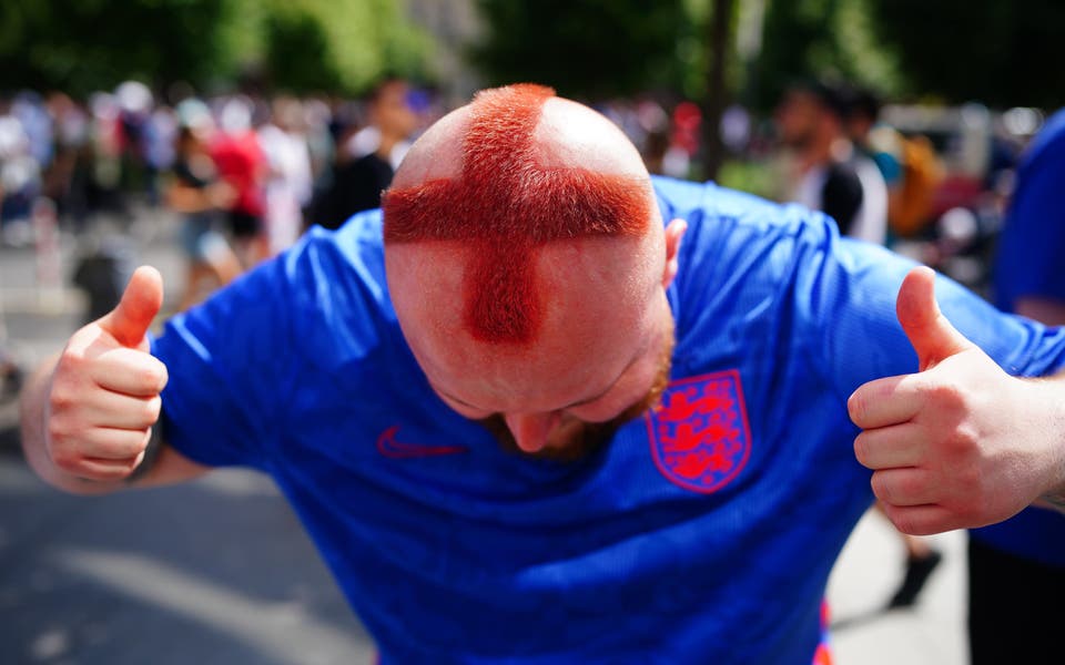 Barber who shaved St George cross into his hair among fans in Berlin