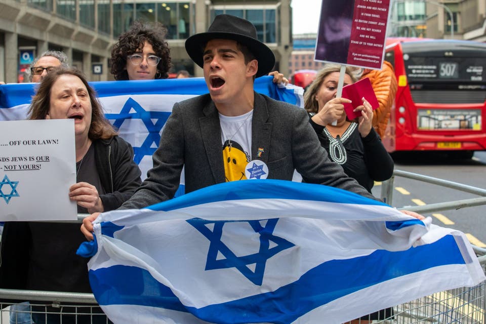 Defiant: activists gather outside Labour Party HQ to protest against Jeremy Corbyn