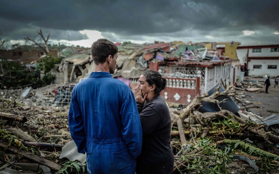 Rare tornado rips through Havana killing three people