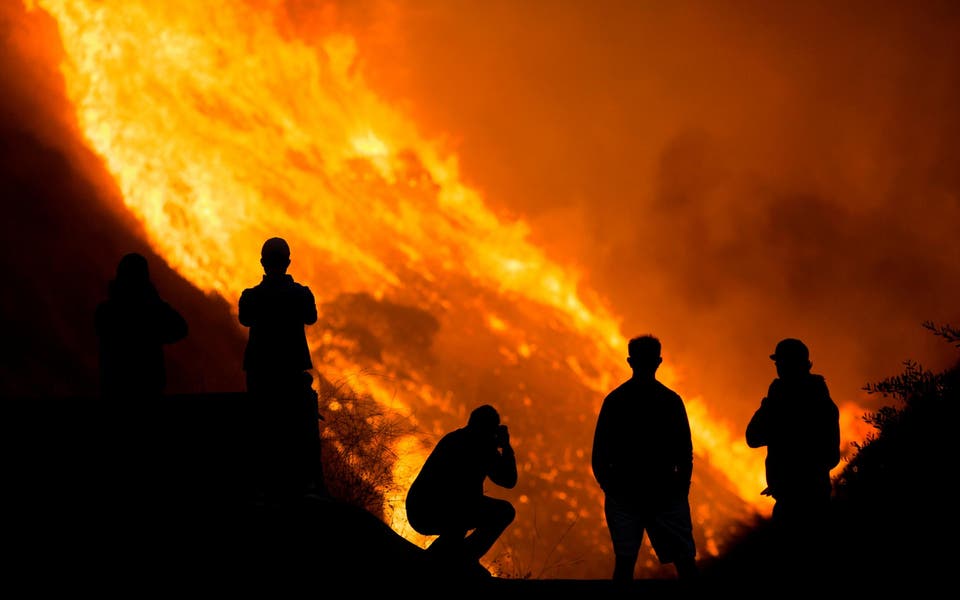 Two firefighters on life support as wildfires ravage California