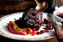 Lamb Necks Braised in Wine With Peppers