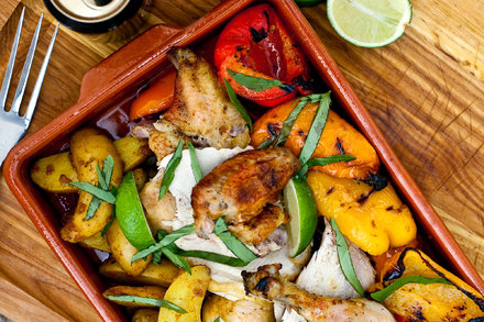 Image for Spice-Rubbed Beer-Can Chicken with Potatoes and Sweet Peppers