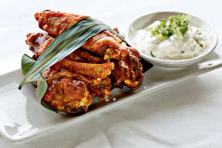 Spicy Sriracha Wings With Cucumber Sour Cream