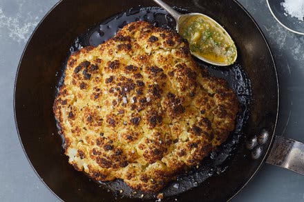 Whole Roasted Cauliflower With Almond-Herb Sauce