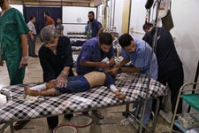 Medics at a field hospital after an airstrike by Syrian government forces in eastern Ghouta, Damascus, in 2016.