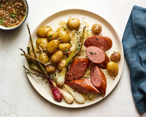 Sheet-Pan Sausage With Spring Onions, Potatoes and Mustard