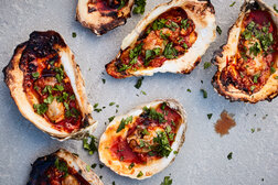 Image for Grilled Oysters With Harissa-Parmesan Butter