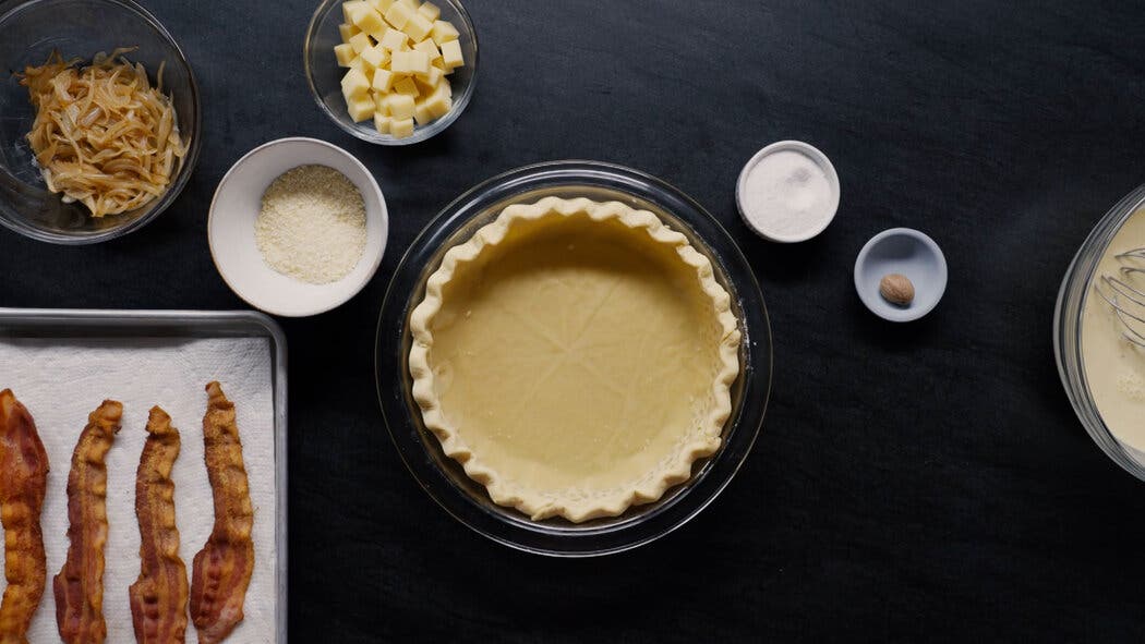 Image of a par-baked crust for making a quiche Lorraine. 