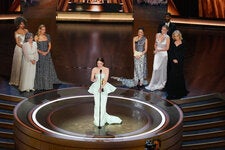 Emma Stone accepting the Oscar for best actress.