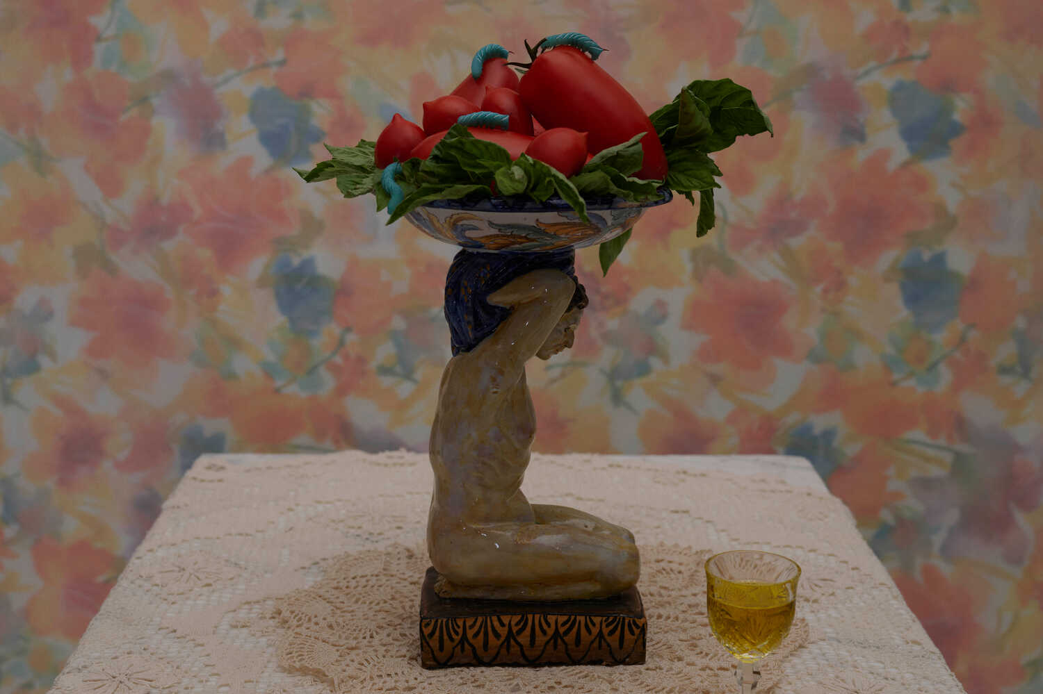 On the pedestal and swarmed by blue tomato hornworms, a mix of the Neapolitan purveyors Sabatino Abagnale’s Miracolo di San Gennaro tomatoes and Pasquale Imperato’s Pomodorini del Piennolo del Vesuvio, imported by Gustiamo in the Bronx.