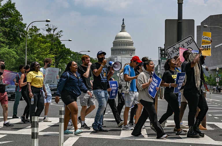 Demonstrators marched from the Supreme Court to the White House last June to call for the cancellation of student debt.