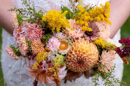 Erin Tobiasz of Pittsburgh included goldenrod, zinnias and other local flowers in her bridal bouquet when she married two years ago.
