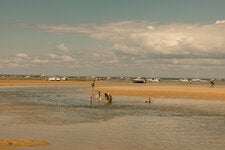 The shallow water on the bassin side of Cap Ferret makes it a great family-friendly swimming spot.