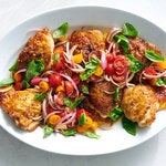 Bright basil, tomato and red onion are a lovely, biting counterpoint to rich chicken fat.