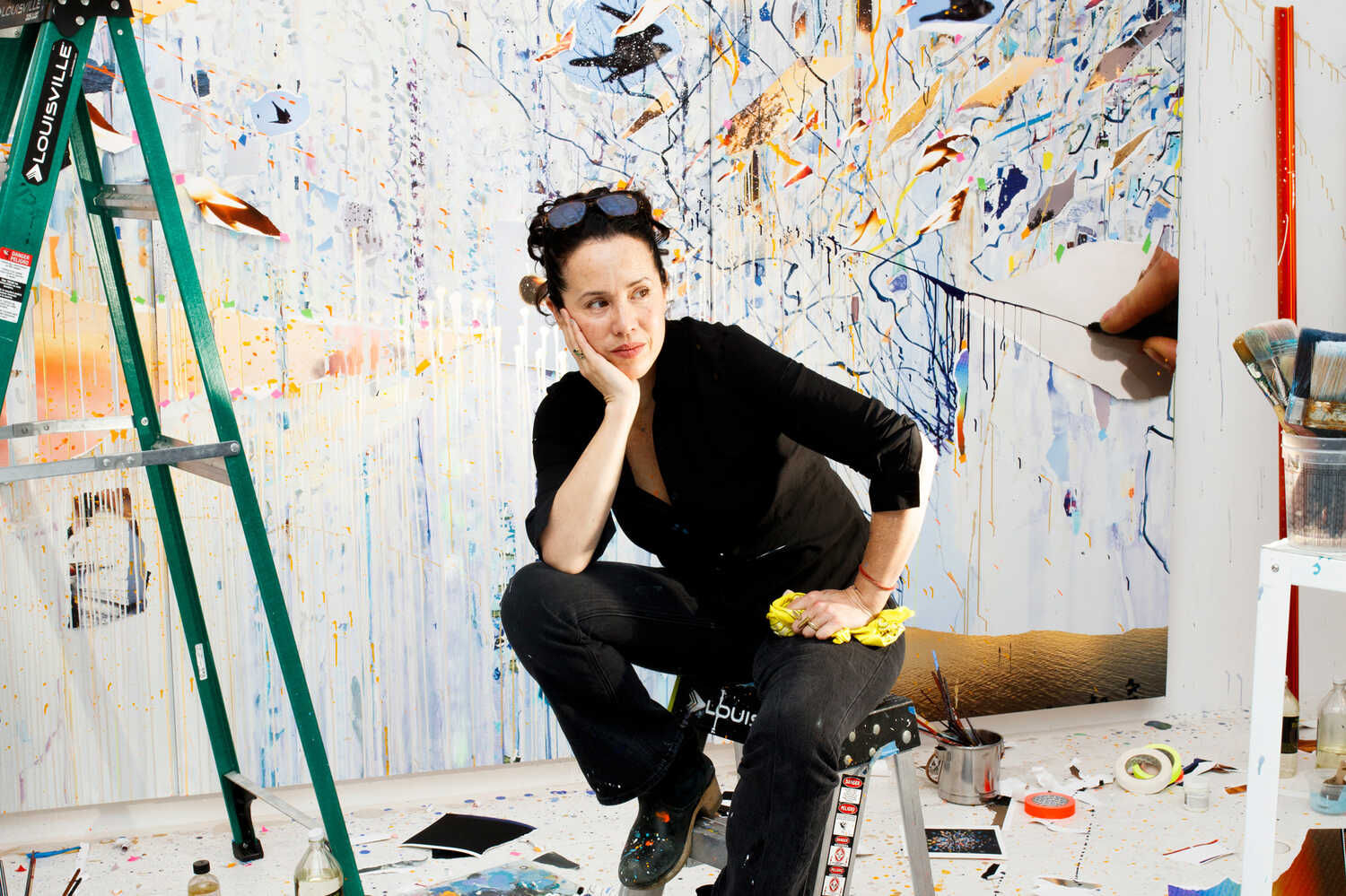 Sarah Sze, photographed in her New York studio with an in-progress painting.