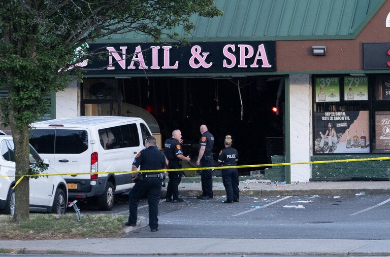Four people were killed and nine were injured when an S.U.V. crashed into a nail salon Friday on Long Island.