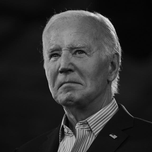 A portrait of Joe Biden looking stern.