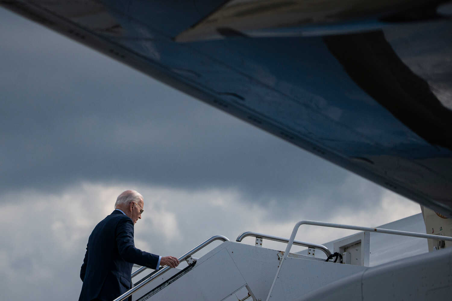 President Biden boarding Air Force One in early June. In the three weeks leading up to the debate against former President Donald J. Trump, he kept up a grueling travel schedule that exhausted even much younger aides.