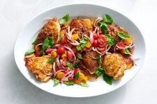 Bright basil, tomato and red onion are a lovely, biting counterpoint to rich chicken fat.