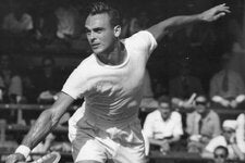 Vic Seixas in action against Herb Flam in the quarterfinals at Wimbledon in 1952. He won the men’s singles championship there the following year, beating Kurt Nielsen of Denmark.