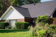 A home with weather-resistant roofing in Enid, Okla., where insurance costs more, as a share of home value, than almost anywhere else in the country.