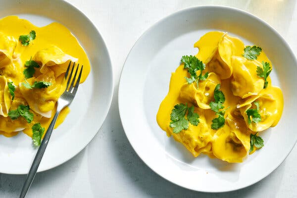 Shrimp Dumplings With Saffron Shallot Sauce