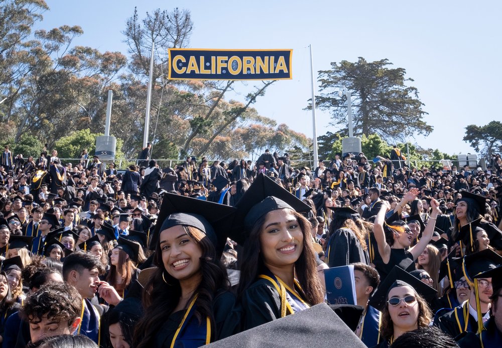 A wide shot of the graduation in Memorial Stadium in 2023